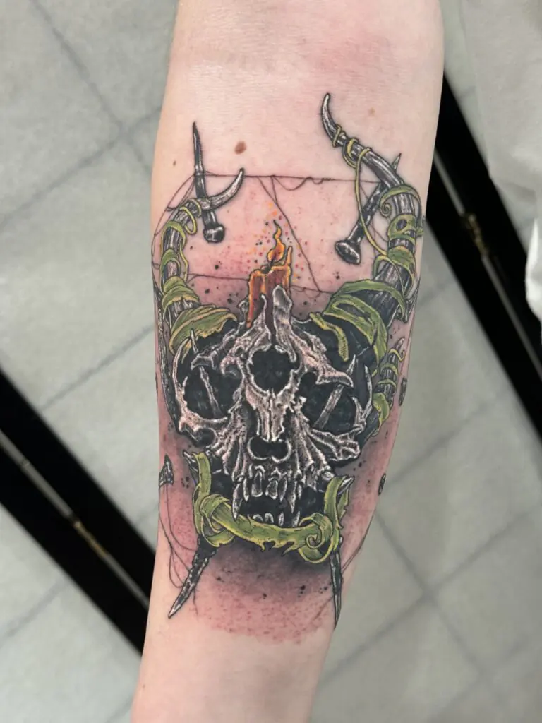 colorful tattoo skull with candle tattoo done by Mangesh rane